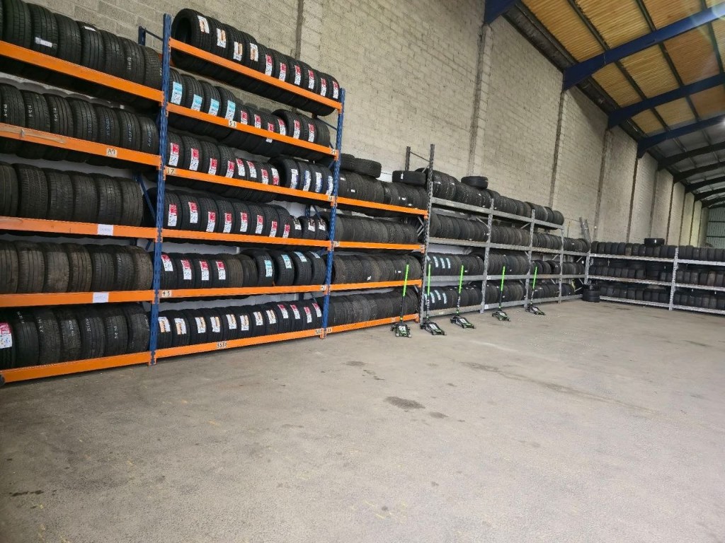 Tyres stored on racks in the Saxilby workshop